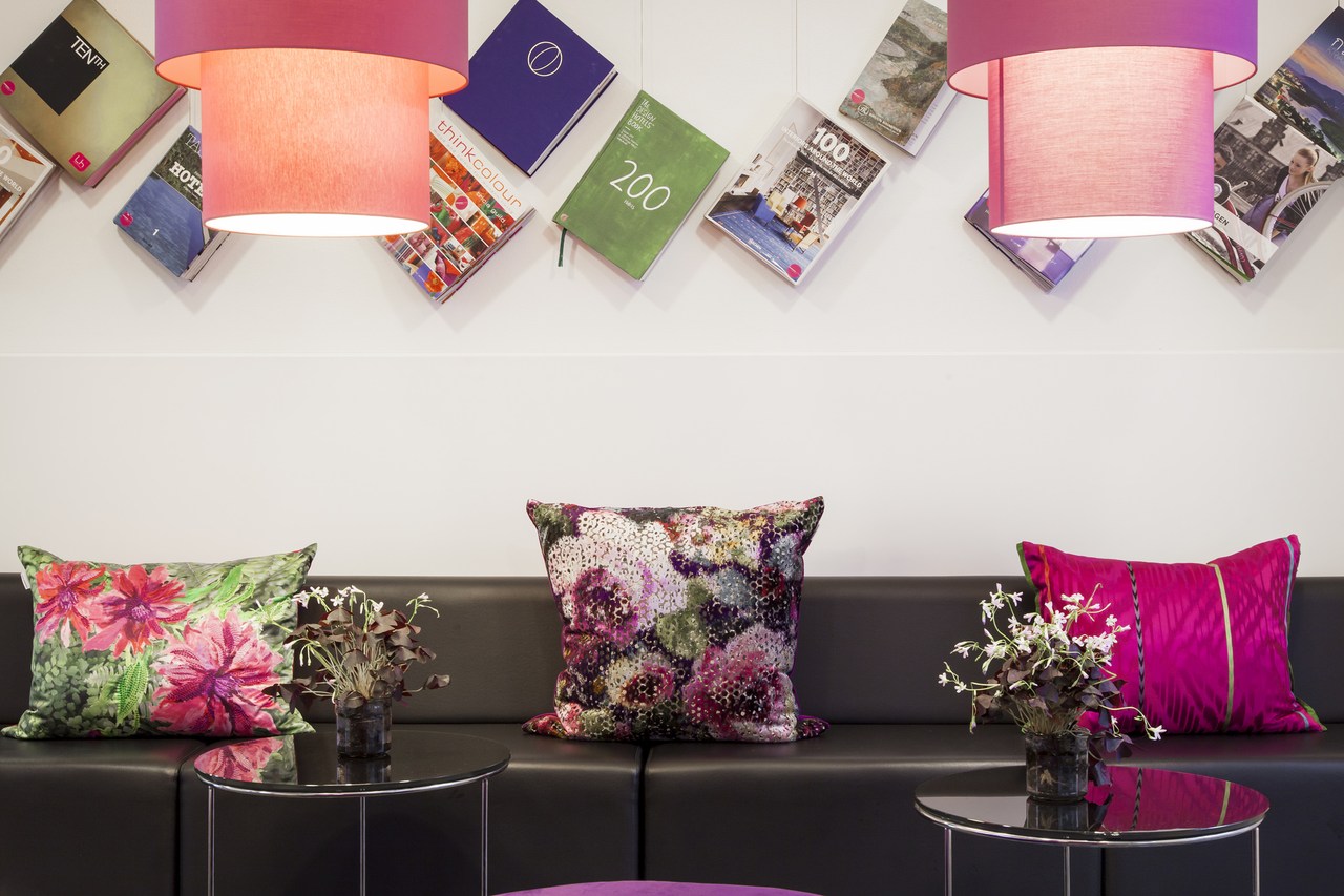 The reading area within the lobby at The Andersen Hotel